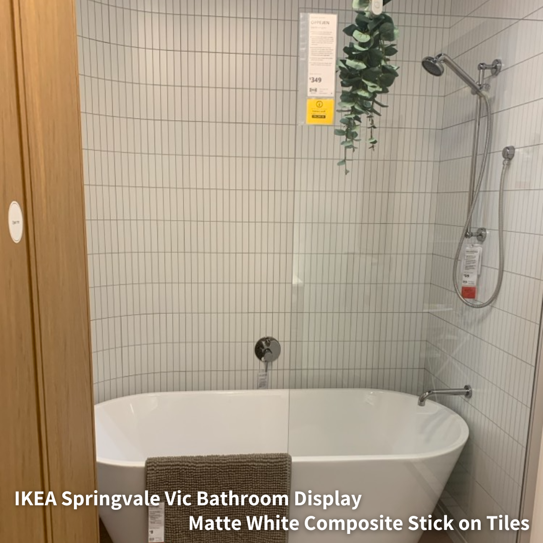 Bathroom display at IKEA Springvale featuring Matte White Kit Kat Stick on Composite Tiles, elegantly installed around a bathtub.