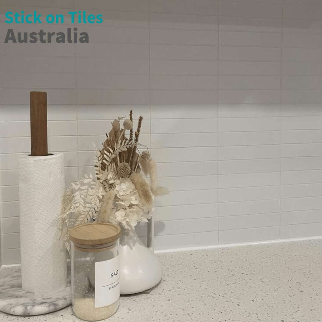 Matte White Kit Kat Stick on Composite Tiles installed in a kitchen, providing a seamless and elegant backsplash for a modern aesthetic.