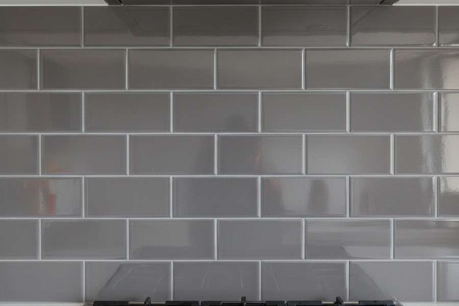 Gray tiled wall with a grid pattern