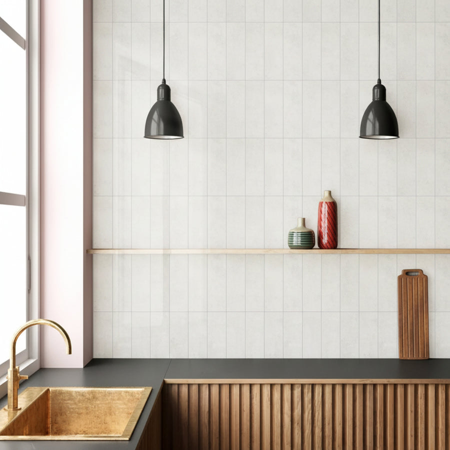 Modern kitchen with tiled wall, black countertop, and wooden shelves.