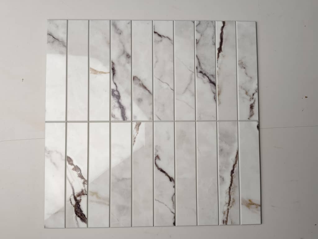 Marble-patterned tiles on a plain background