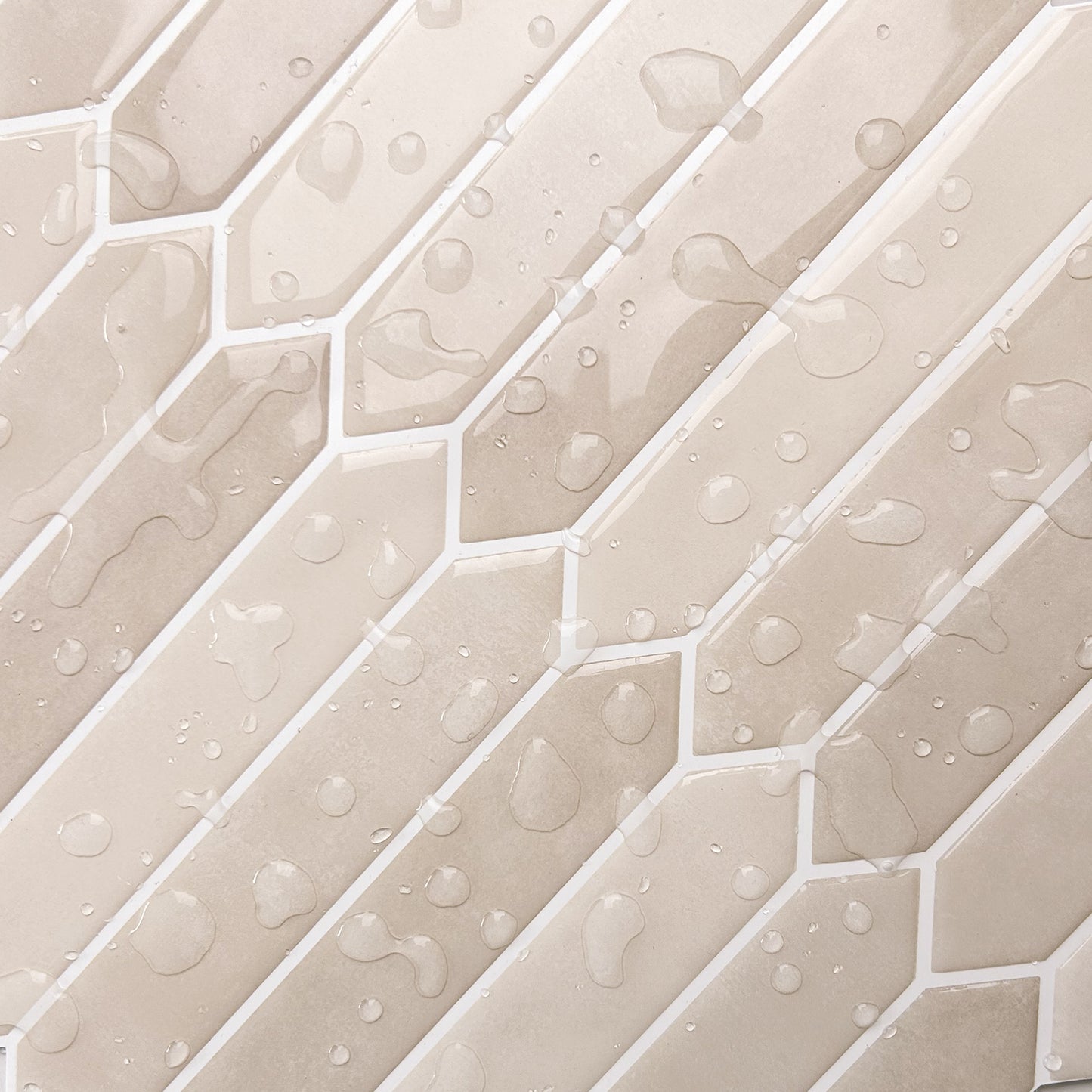 Close-up of beige hexagonal tiles with water droplets