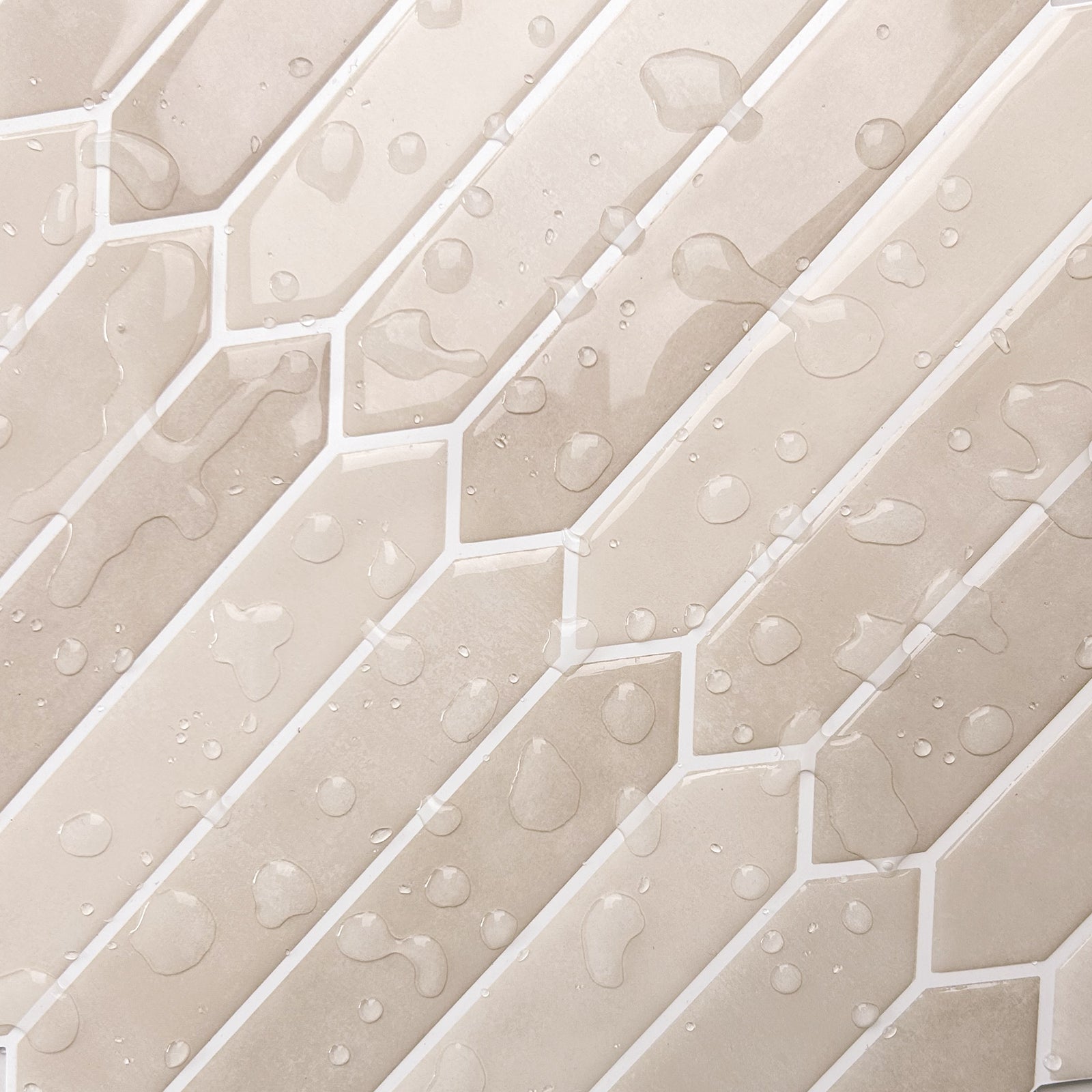 Close-up of beige hexagonal tiles with water droplets