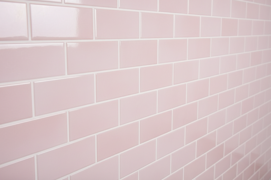 Close-up of a wall with pink tiles
