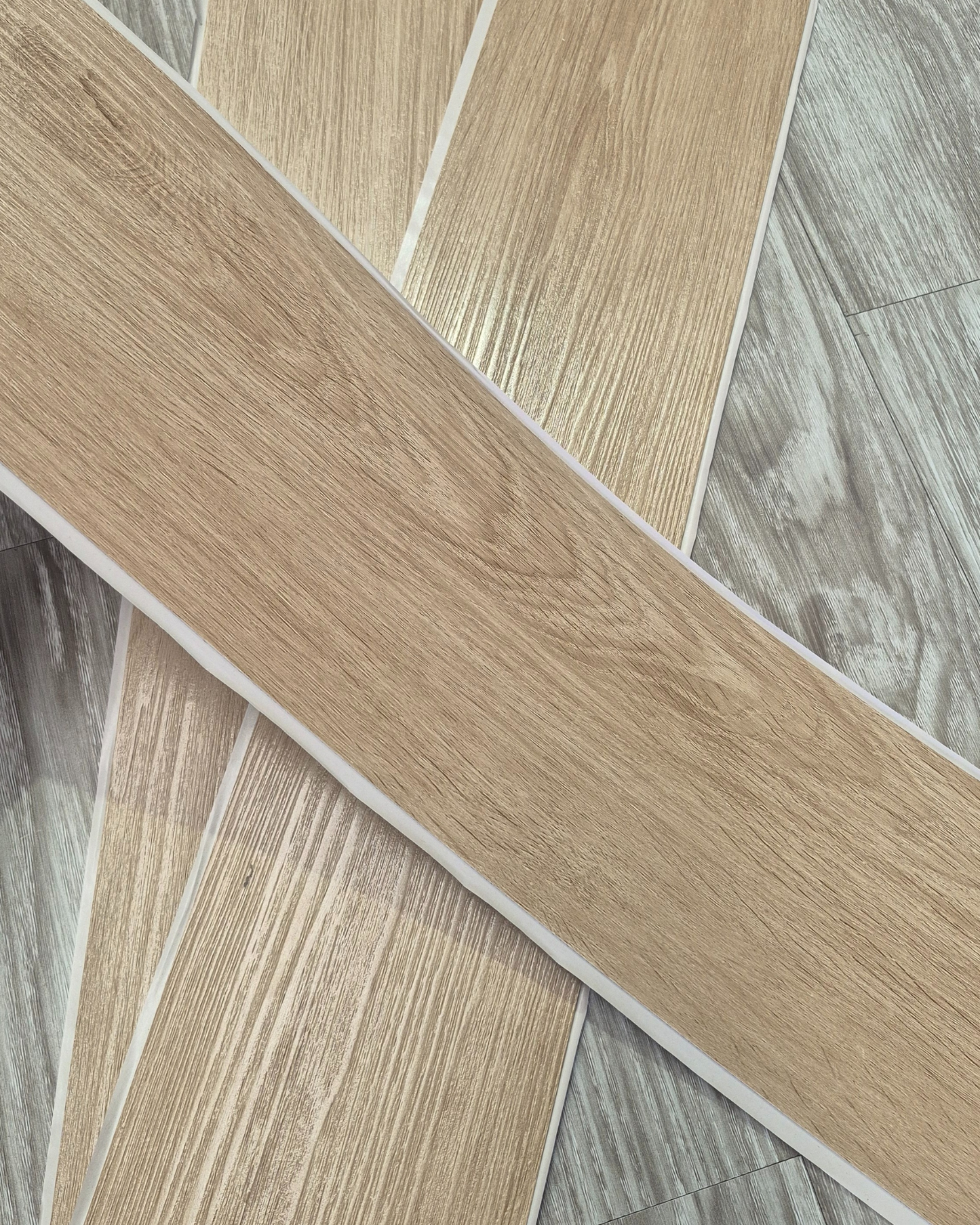 Close-up of wood-patterned tiles in a staggered arrangement