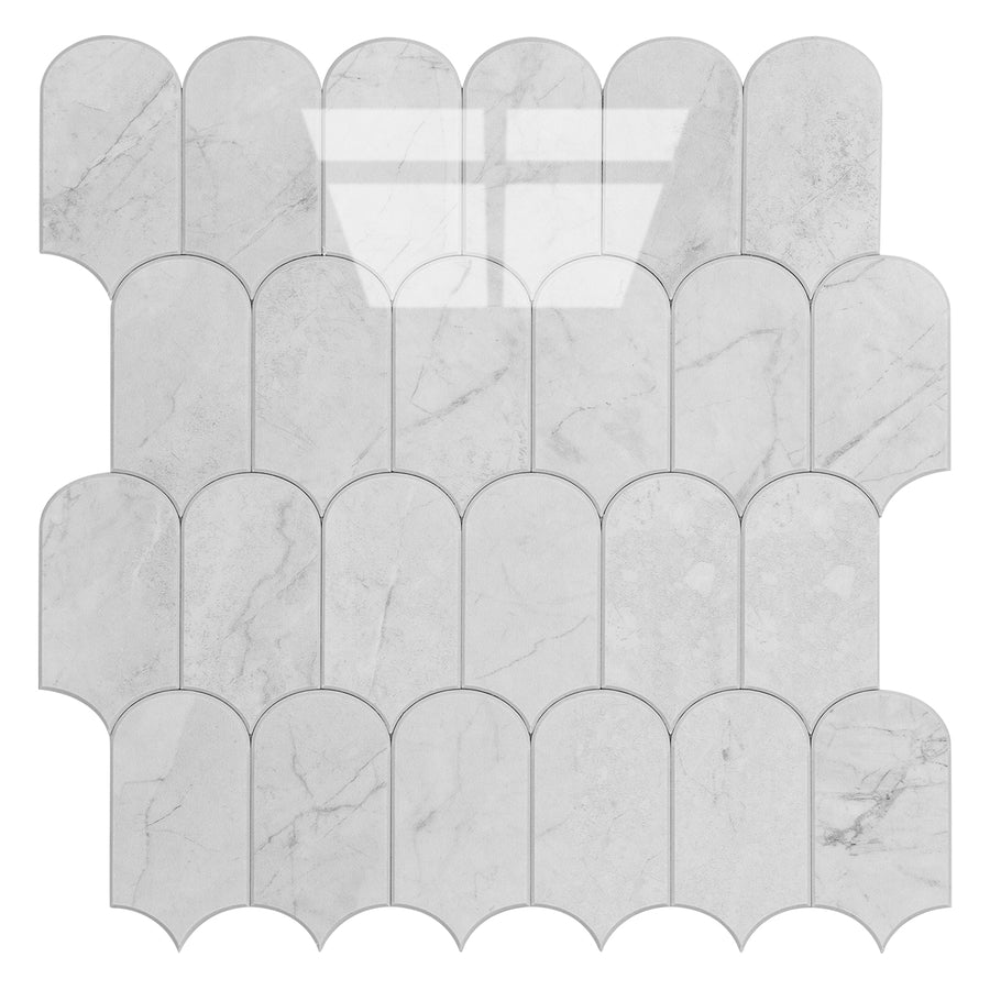 Marble mosaic tile with a scalloped edge pattern on a white background